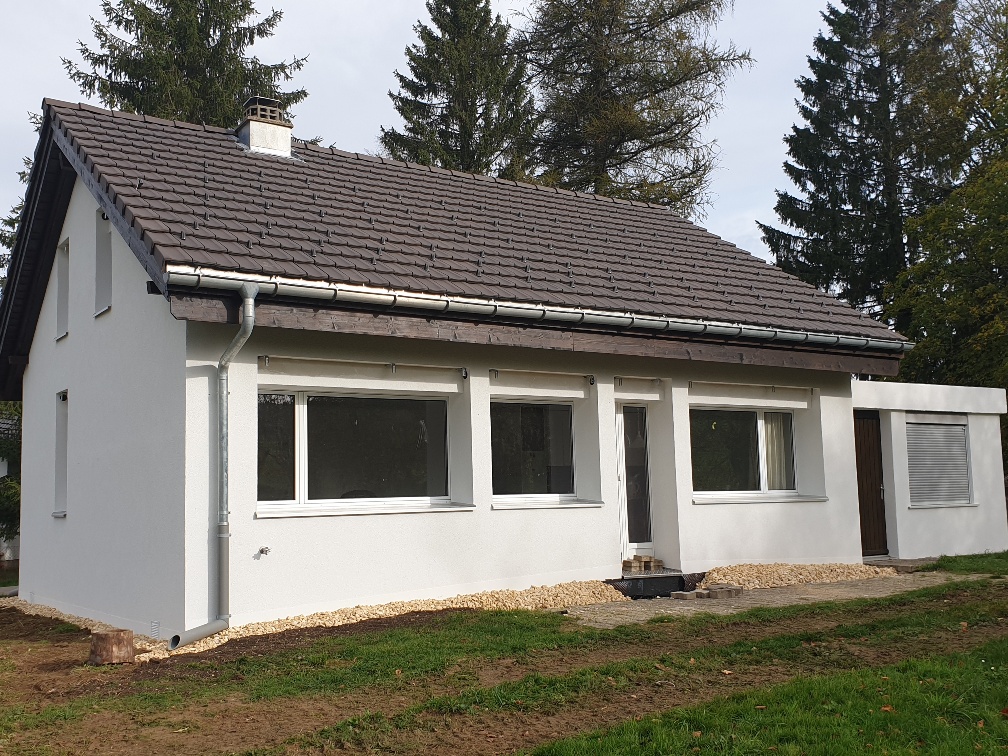 Amélioration énergétique du bâtiment (isolation façades, toiture et remplacement fenêtres)